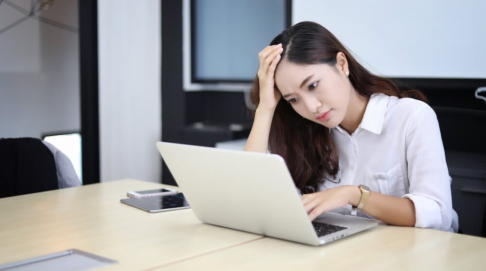 Business woman stressing over her accounting services in Singapore